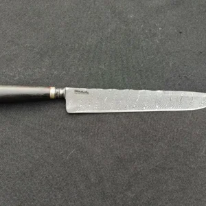 Faca integral em damasco cabo torneado.webp